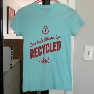 Women T shirt sold at Coca Cola museum in Atlanta. Never worn.
